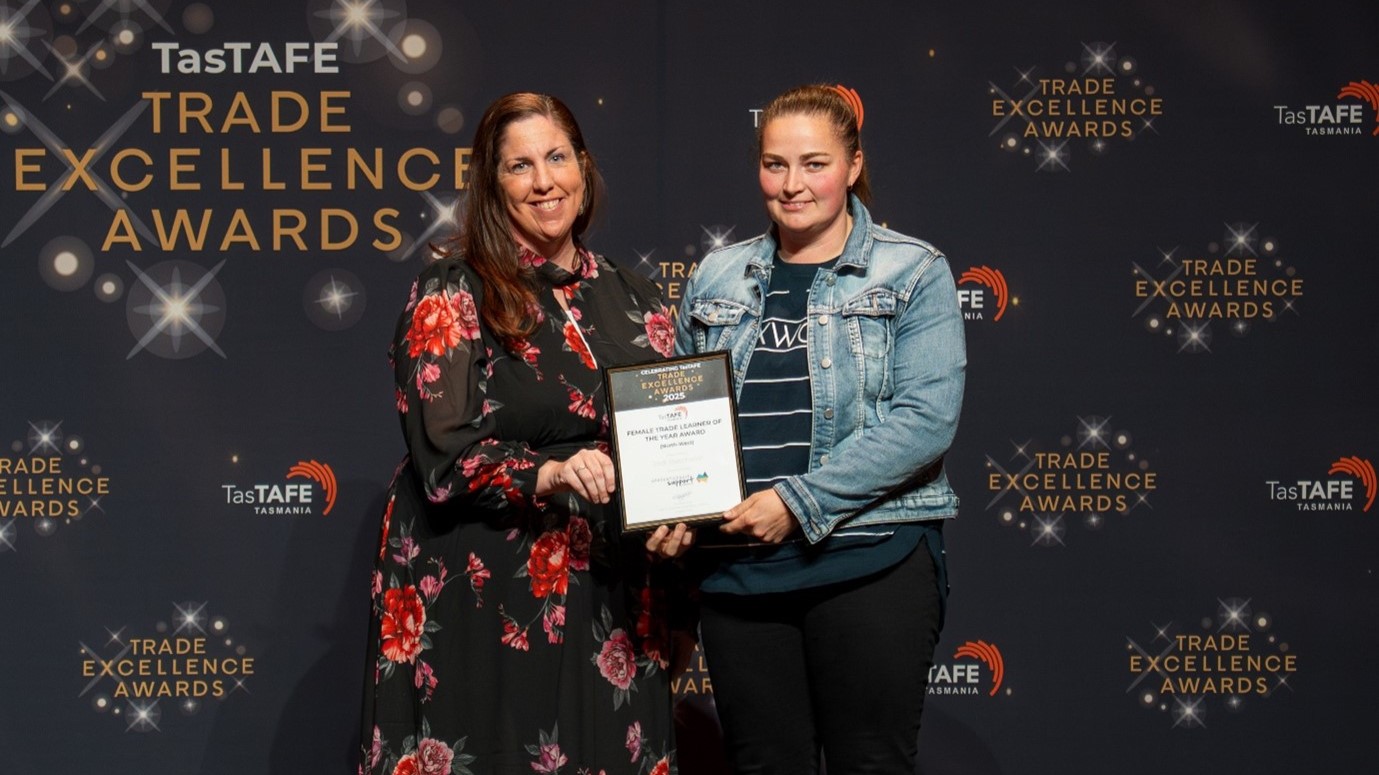 Jodi collects her award