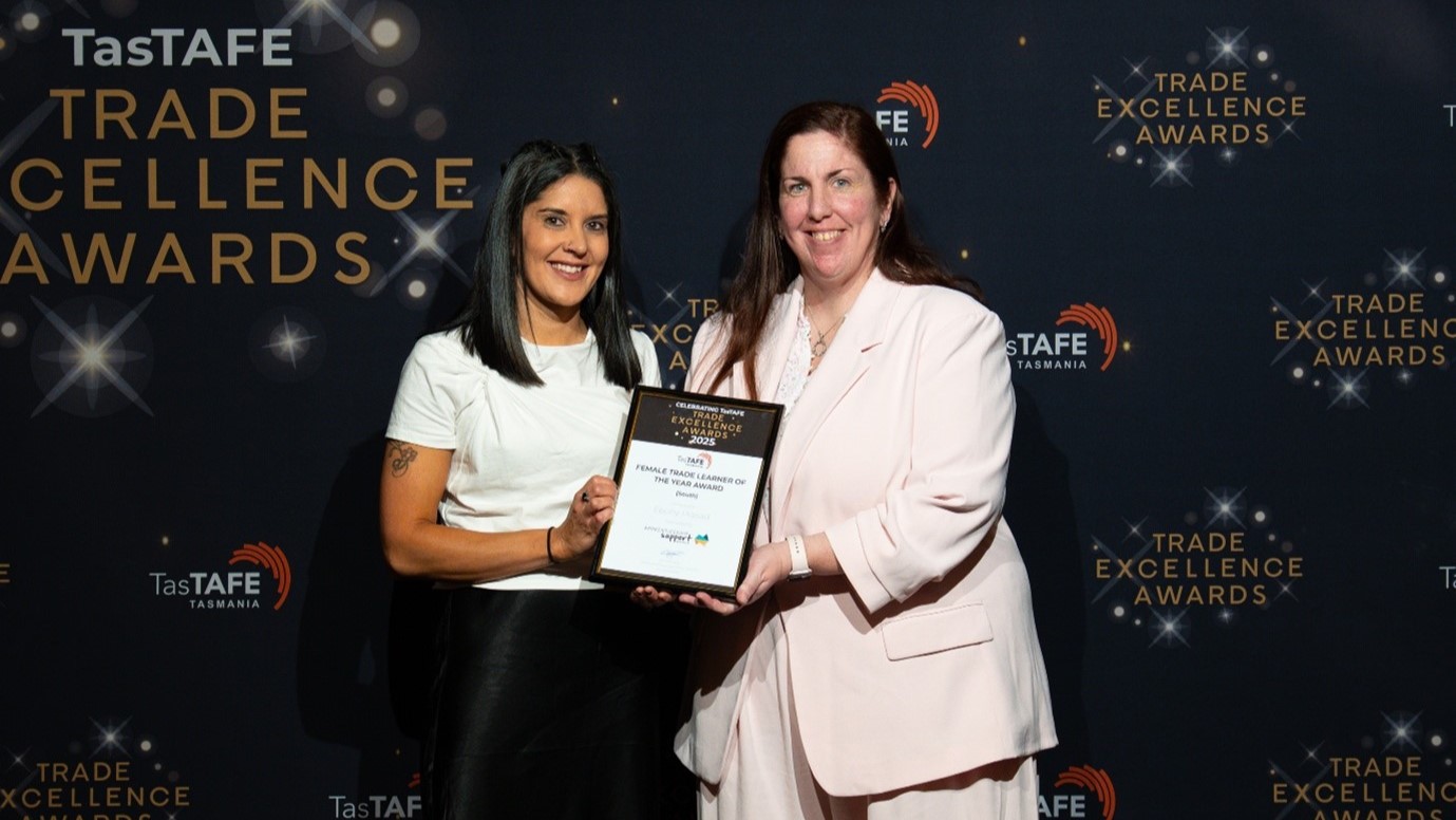 Ebony collects her award